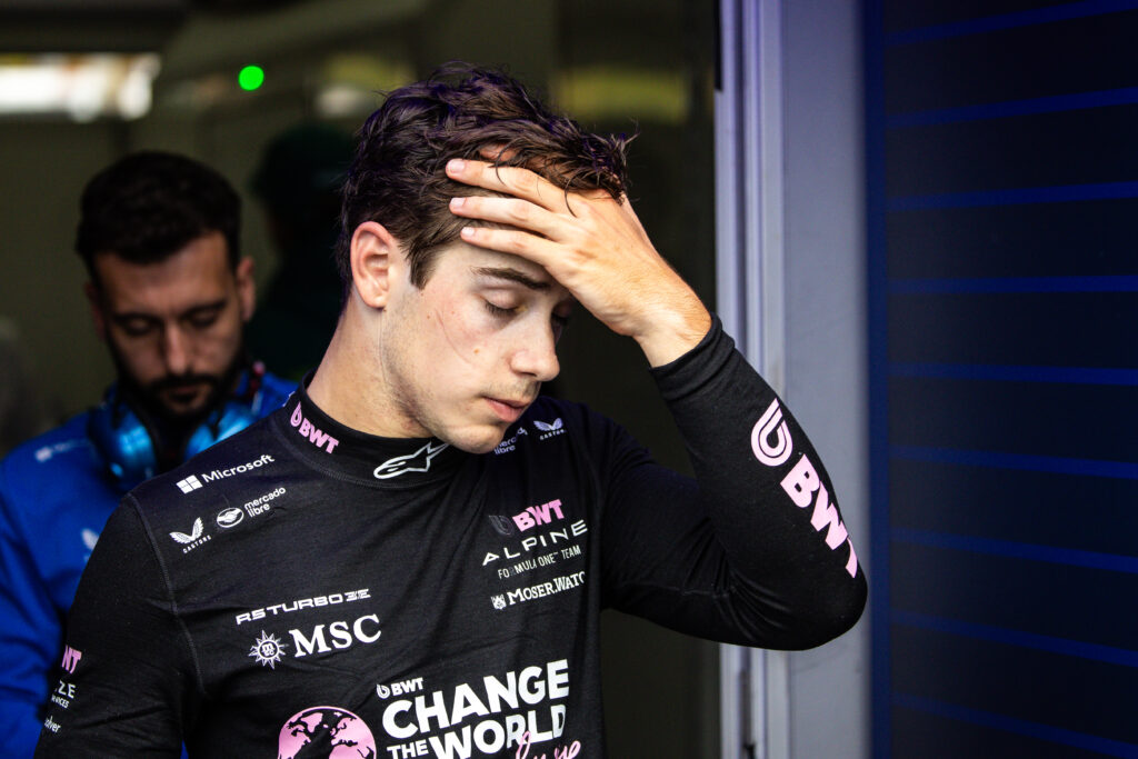 Franco Colapinto of Alpine walks out of the FIA garage at the 2025 Belgian Grand Prix
