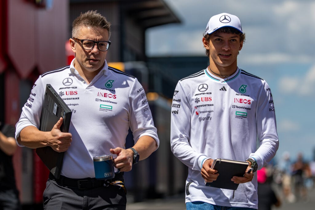 Andrea Kimi Antonelli walks with Peter Bonnington.