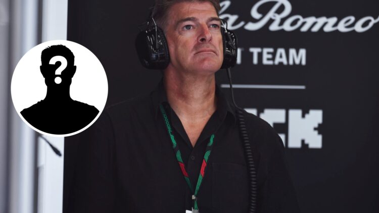 Graeme Lowdon of Cadillac watches an F1 race from the garage; inset of a mystery driver