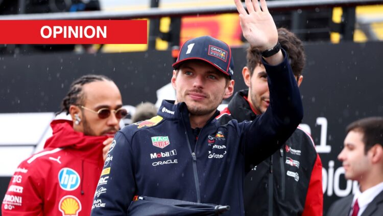 Max Verstappen waving to the crowd with Lewis Hamilton behind.