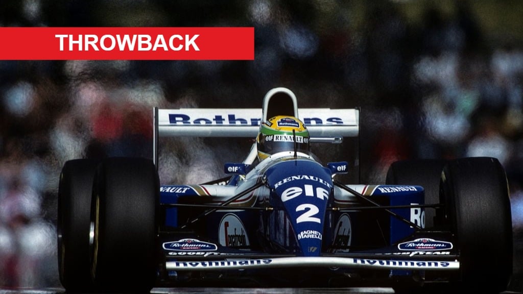 Front view of Ayrton Senna driving the blue and white Rothmans Williams-Renault Formula 1 car, with the word "THROWBACK" in a red banner at the top...