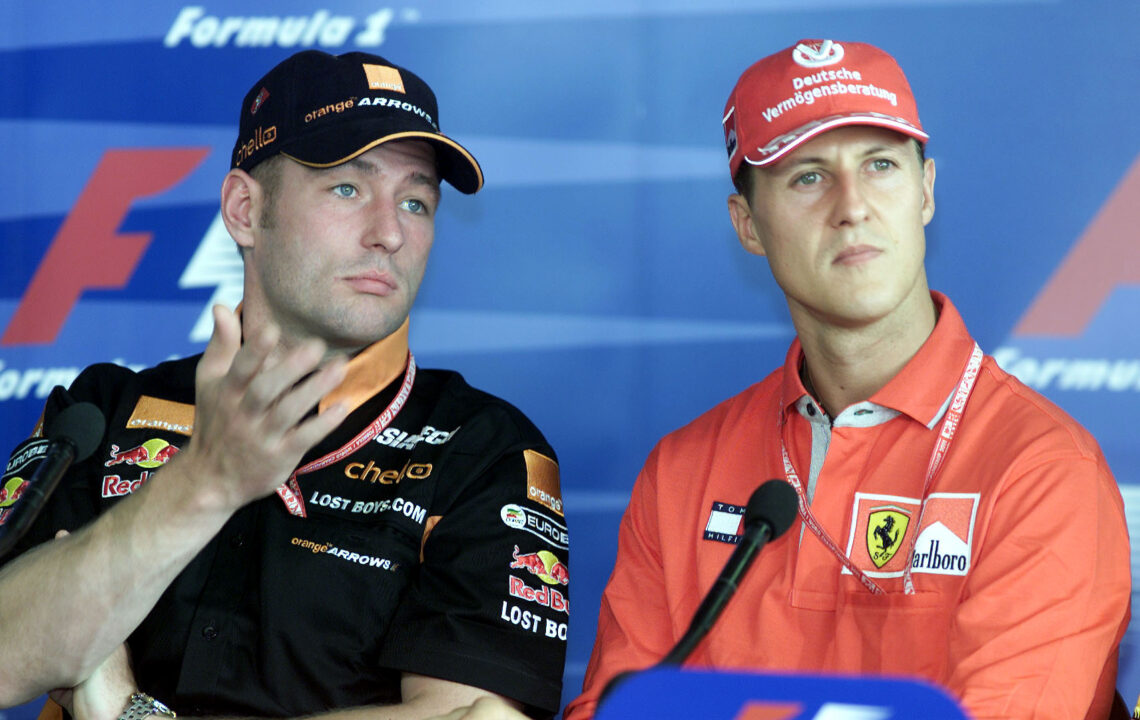 29 Mar 2001: Jos Verstappen (left) of Holland and Arrows chats to Michael Schumacher of Germany and Ferrari during a press conference for the Formu...
