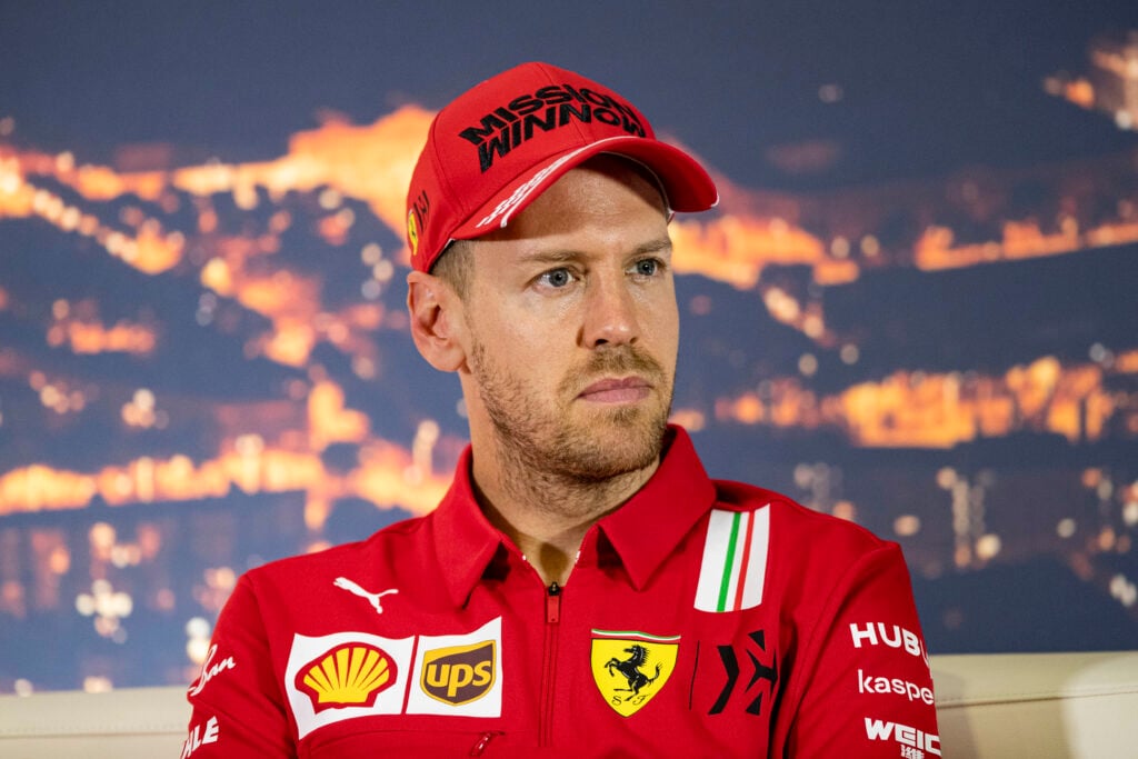 Sebastian Vettel speaks in a press conference as a Ferrari driver