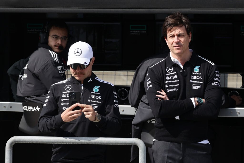 Valtteri Bottas and Toto Wolff watching from the pit-wall at pre-season testing in 2025