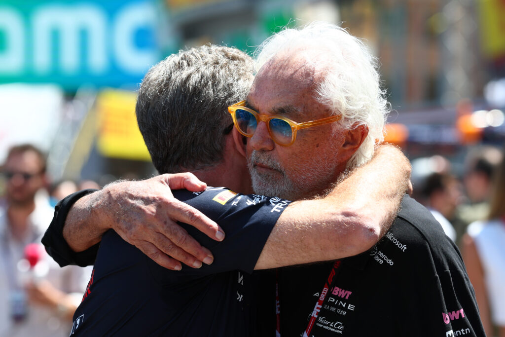 Flavio Briatore of Alpine embraces Christian Horner
