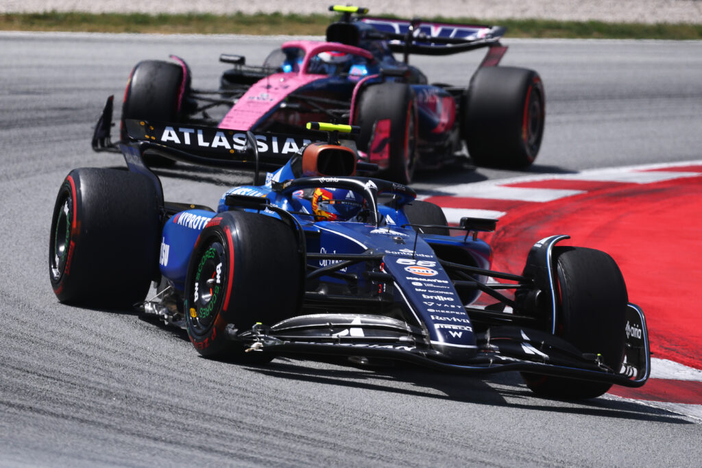 Alpine's Franco Colapinto follows Carlos Sainz of Williams in the 2025 F1 Spanish Grand Prix
