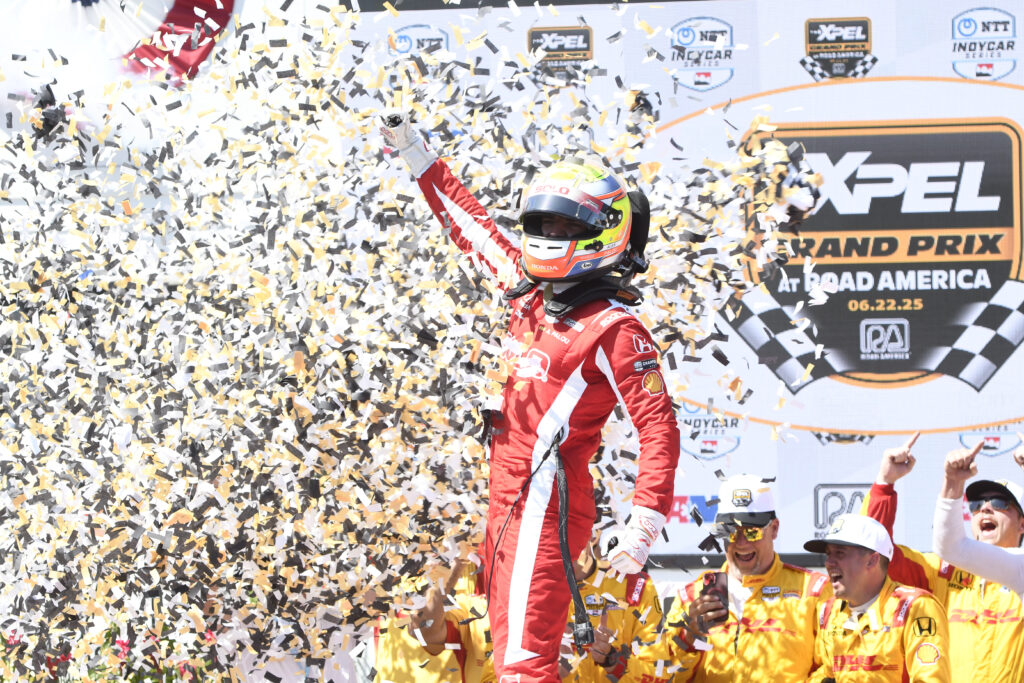 Alex Palou celebrates after winning his fourth IndyCar championship