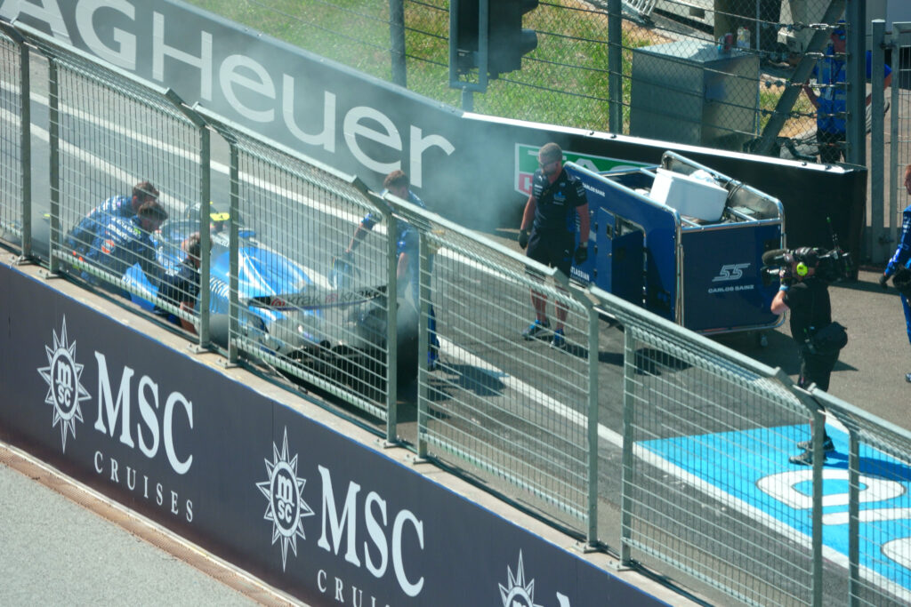 Carlos Sainz's FW47 on fire in the pit lane at the 2025 Austrian Grand Prix