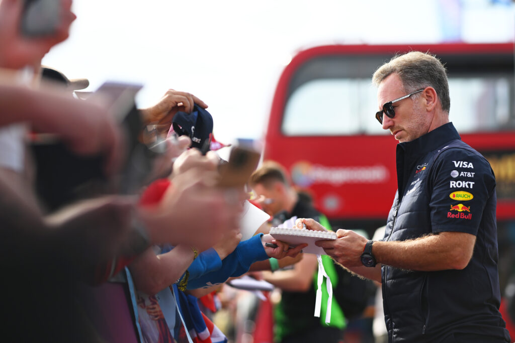 Christian Horner signs autographs at the 2025 British Grand Prix