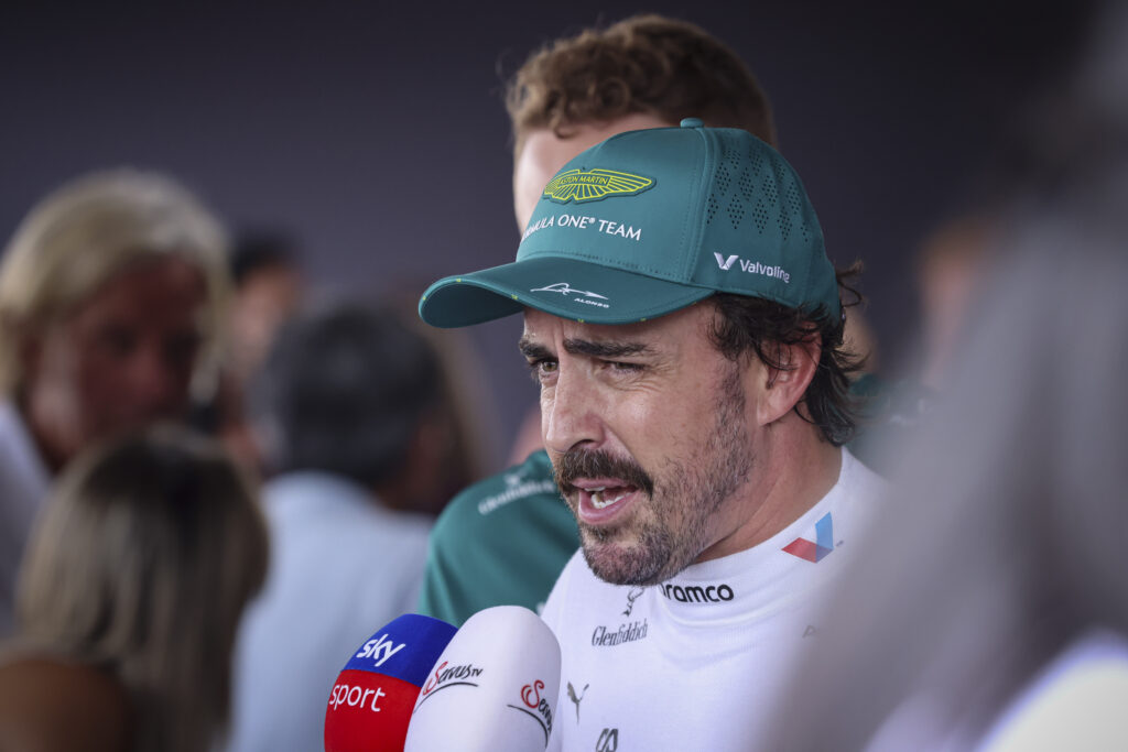 Aston Martin driver Fernando Alonso being interviewed at the Hungarian Grand Prix