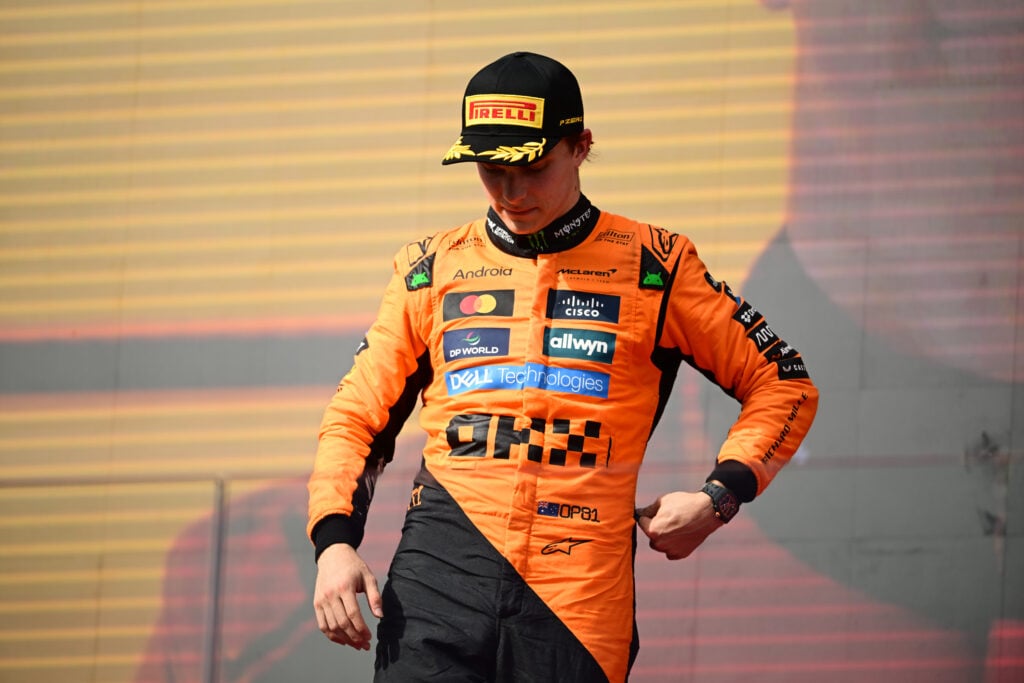Oscar Piastri of McLaren stands on the F1 podium