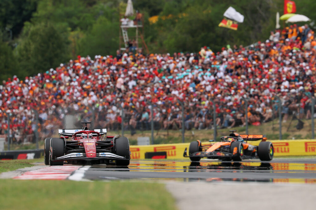 McLaren's Oscar Piastri chases Ferrari's Charles Leclerc during the 2025 F1 Hungarian Grand prix