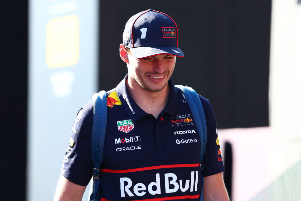 Max Verstappen of Red Bull smiles in the F1 paddock