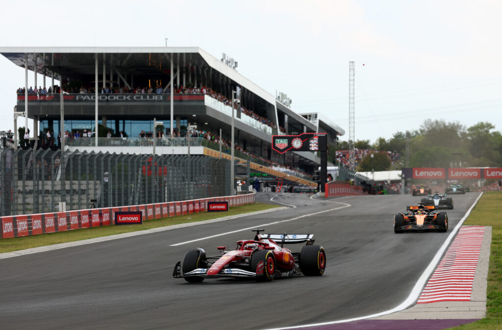 Ferrari driver Charles Leclerc leading the 2025 Formula 1 Hungarian Grand Prix