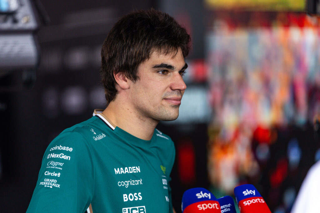 Aston Martin driver Lance Stroll being interviewed at the 2025 Hungarian Grand Prix