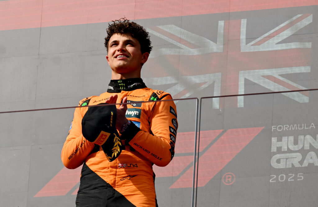 McLaren driver Lando Norris celebrates on the 2025 F1 Hungarian Grand Prix podium