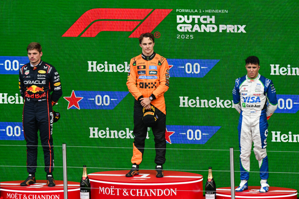 Max Verstappen, Oscar Piastri and Isack Hadjar on the podium at the 2025 Formula 1 Dutch Grand Prix