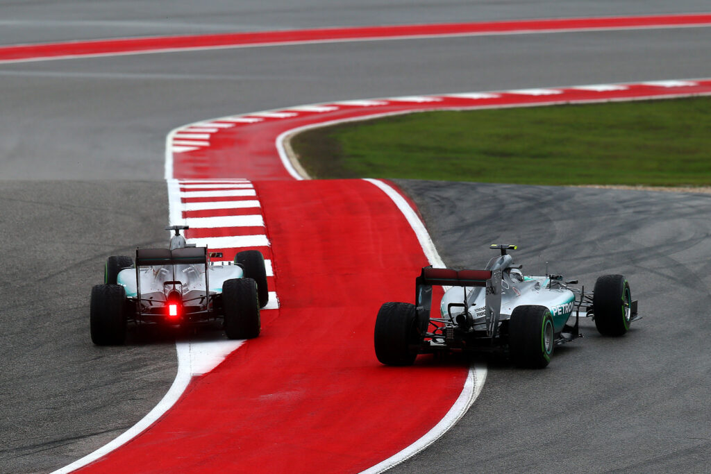 Lewis Hamilton and Nico Rosberg of Mercedes battle at the 2016 US Grand Prix