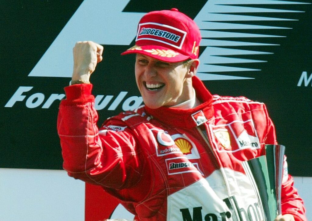 Ferrari driver Michael Schumacher celebrating at the 2003 Italian Grand Prix