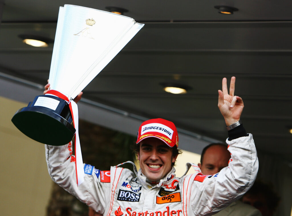 Fernando Alonso holds up the winner's trophy for the 2007 Monaco Grand Prix