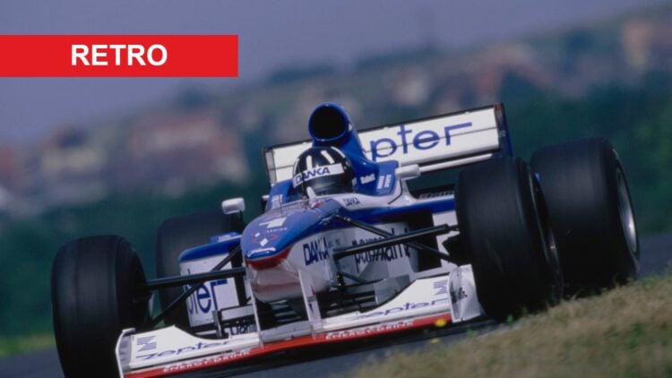 Damon Hill driving the Arrows A18 at the 1997 Hungarian Grand Prix, with a Retro label