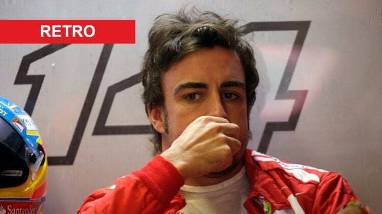 Fernando Alonso of Ferrari pictured in the garage at the 2014 Canadian Grand Prix, with a Retro banner