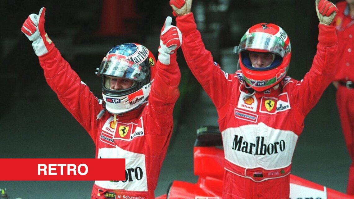 Ferrari drivers Eddie Irvine and Michael Schumacher celebrating during the 1999 Formula 1 season