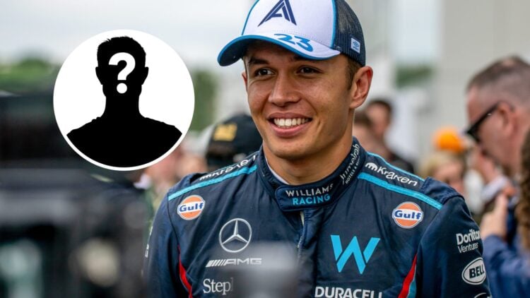 Alex Albon walking through the F1 paddock in Williams overalls with a mystery image in the overlay