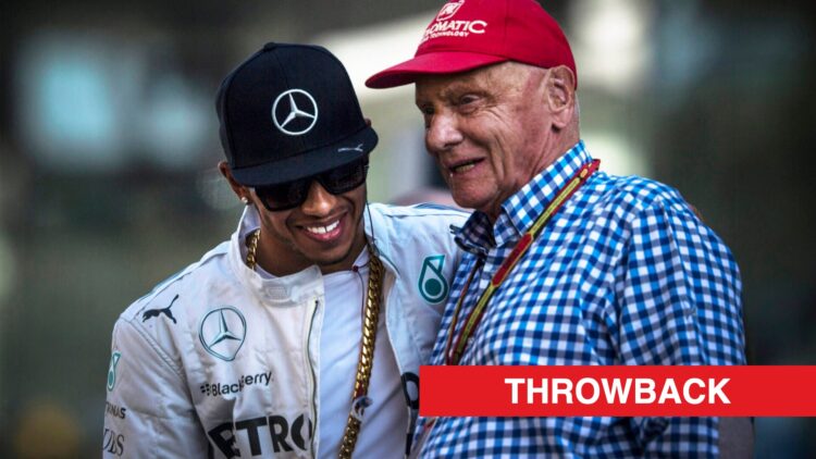 Lewis Hamilton and Niki Lauda sharing a joke in the F1 paddock