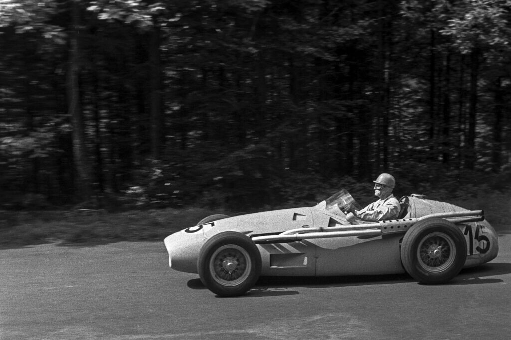 Louis Rosier racing through the trees at the 1956 German Grand Prix