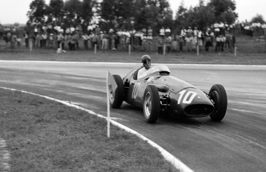 Brazilian driver Chico Landi driving a Maserati at the 1956 Formula 1 Argentinian Grand Prix