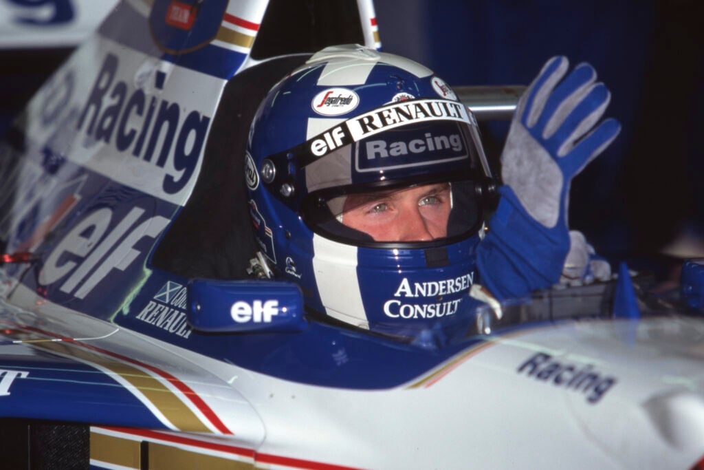 Williams driver David Coulthard sitting in his car at the 1995 Formula 1 British Grand Prix