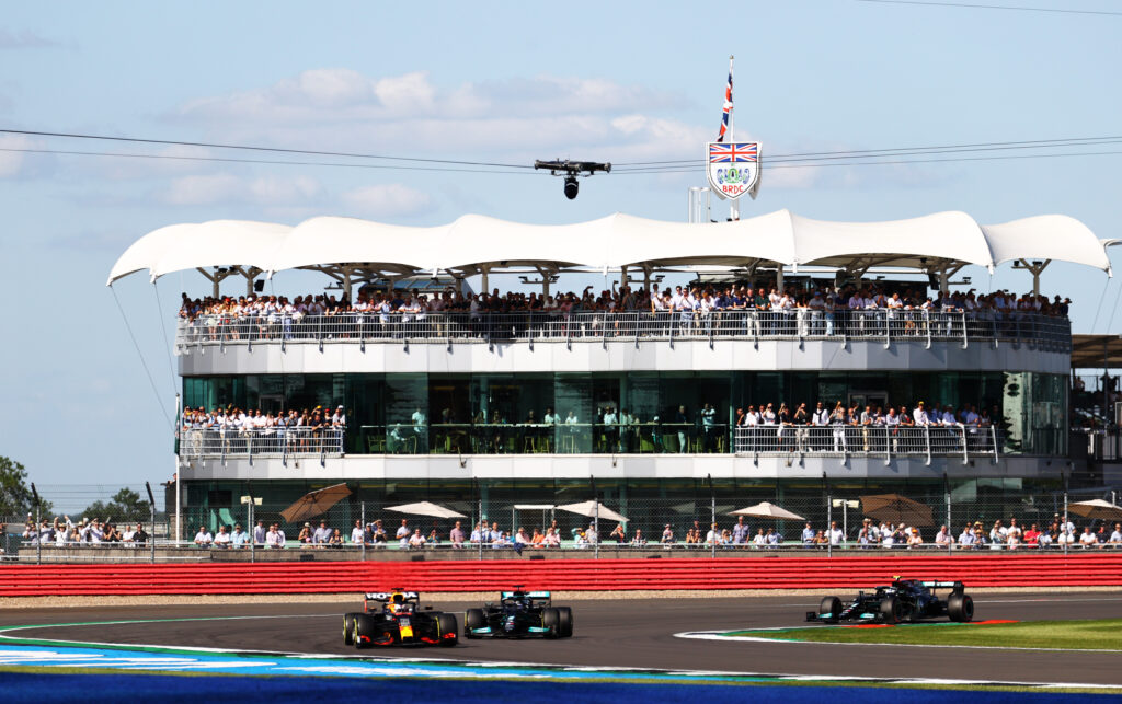 Red Bull's Max Verstappen and Mercedes' Lewis Hamilton fight over the lead of the Silverstone Sprint at the 2021 F1 British Grand Prix