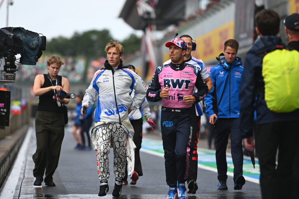 Racing Bulls driver Liam Lawson and Alpine driver Pierre Gasly at the 2025 British Grand Prix