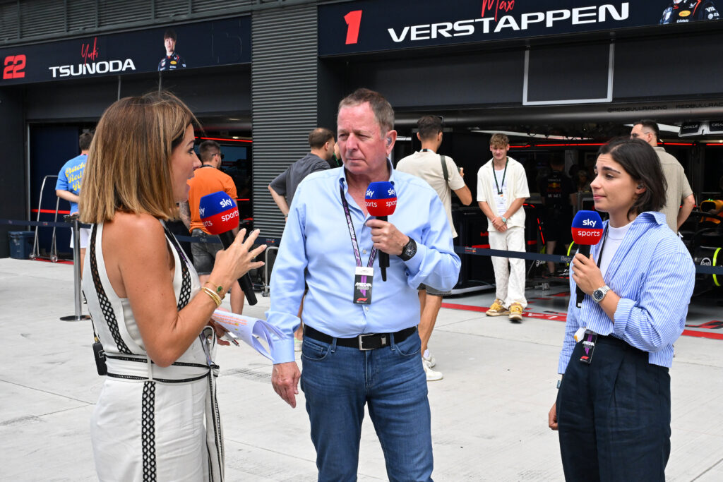 Natalie Pinkham, Martin Brundle and Jamie Chadwick speak in the Italian Grand Prix pit lane