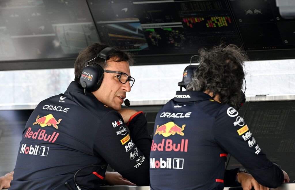 Pierre Wache and Laurent Mekies sit on the Red Bull pit wall at the Italian Grand Prix