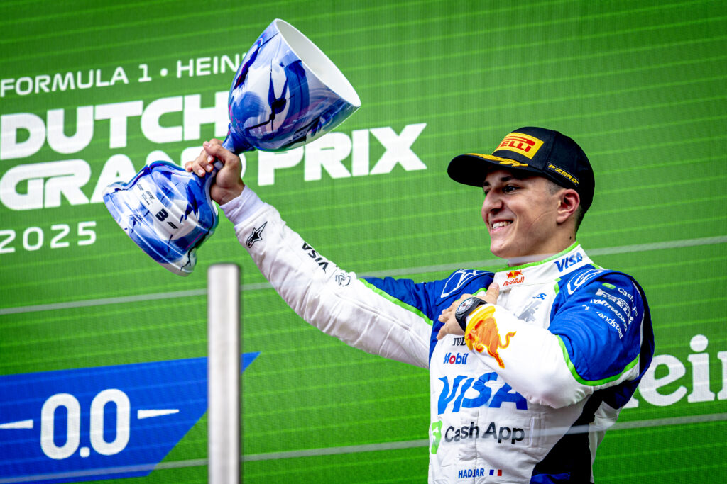 Racing Bulls driver Isack Hadjar on the podium at the 2025 Dutch Grand Prix