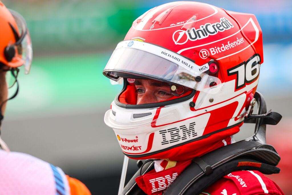 Charles Leclerc speaks to a marshal after crashing at the 2025 Dutch Grand Prix