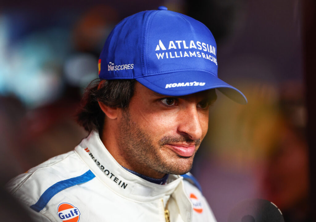Carlos Sainz smiles in an interview for Williams