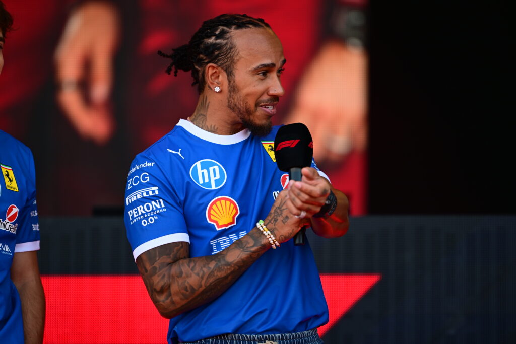 Ferrari driver Lewis Hamilton addressing the crowd at the 2025 Formula 1 Italian Grand Prix