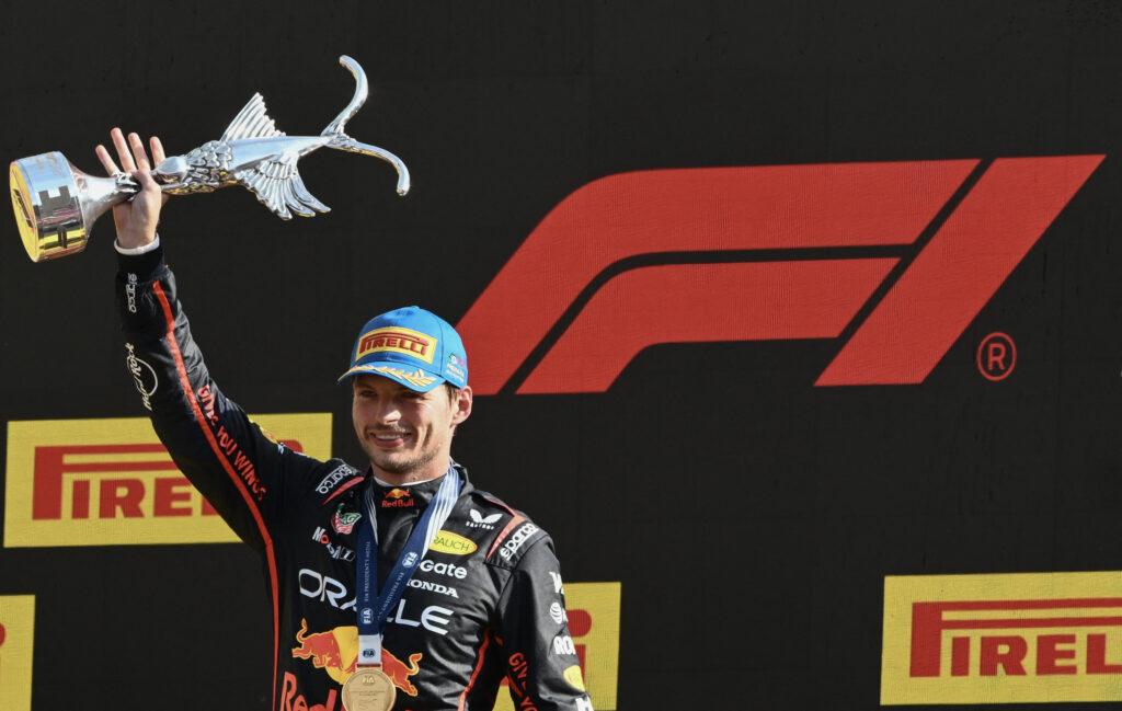 Red Bull driver Max Verstappen celebrates winning the 2025 F1 Italian Grand Prix on the Monza podium