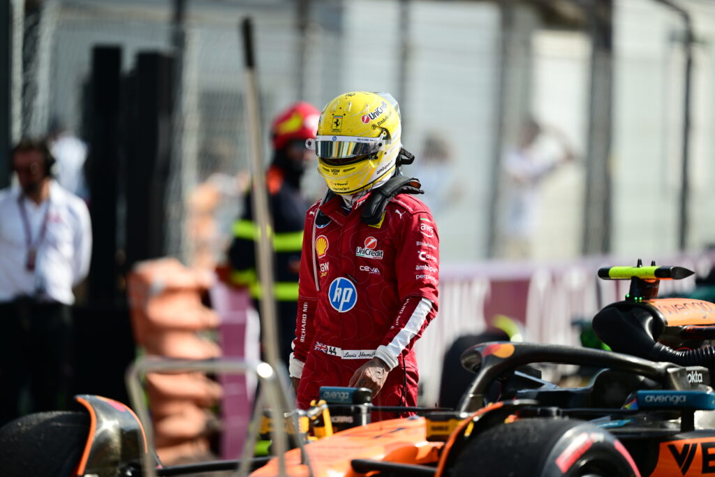 Lewis Hamilton of Ferrari walks through parc ferme at the Italian Grand Prix