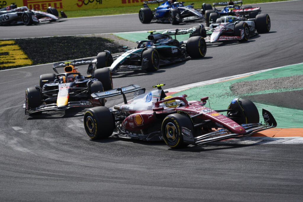 Ferrari driver Lewis Hamilton leads a train of cars at the 2025 Formula 1 Italian Grand Prix