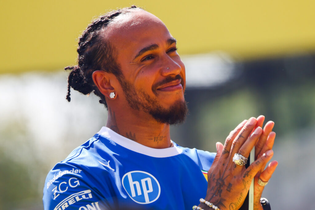 Ferrari driver Lewis Hamilton applauding the fans at the 2025 Formula 1 Italian Grand Prix