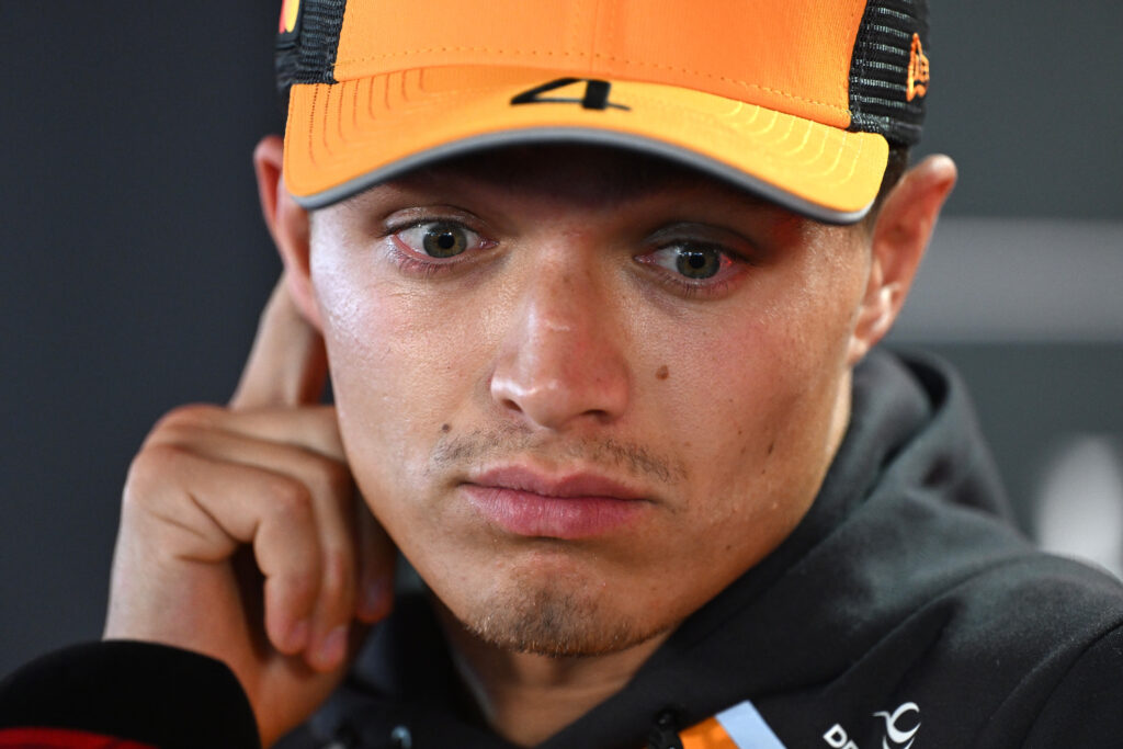 Lando Norris of McLaren stares during an interview