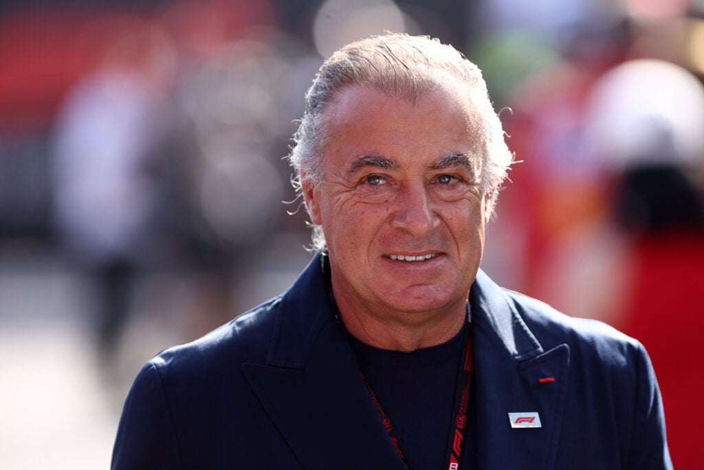 Former Ferrari driver Jean Alesi smiling in the paddock at the 2025 Formula 1 Italian Grand Prix