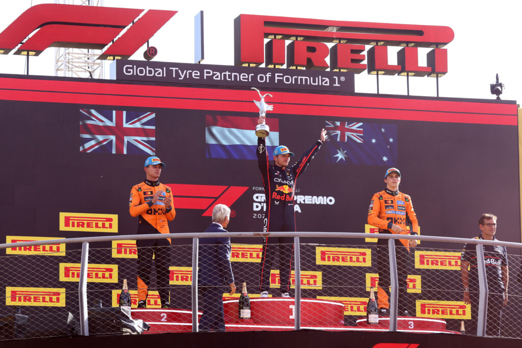 Red Bull driver Max Verstappen stands atop the Monza paddock after winning the 2025 F1 Italian Grand Prix