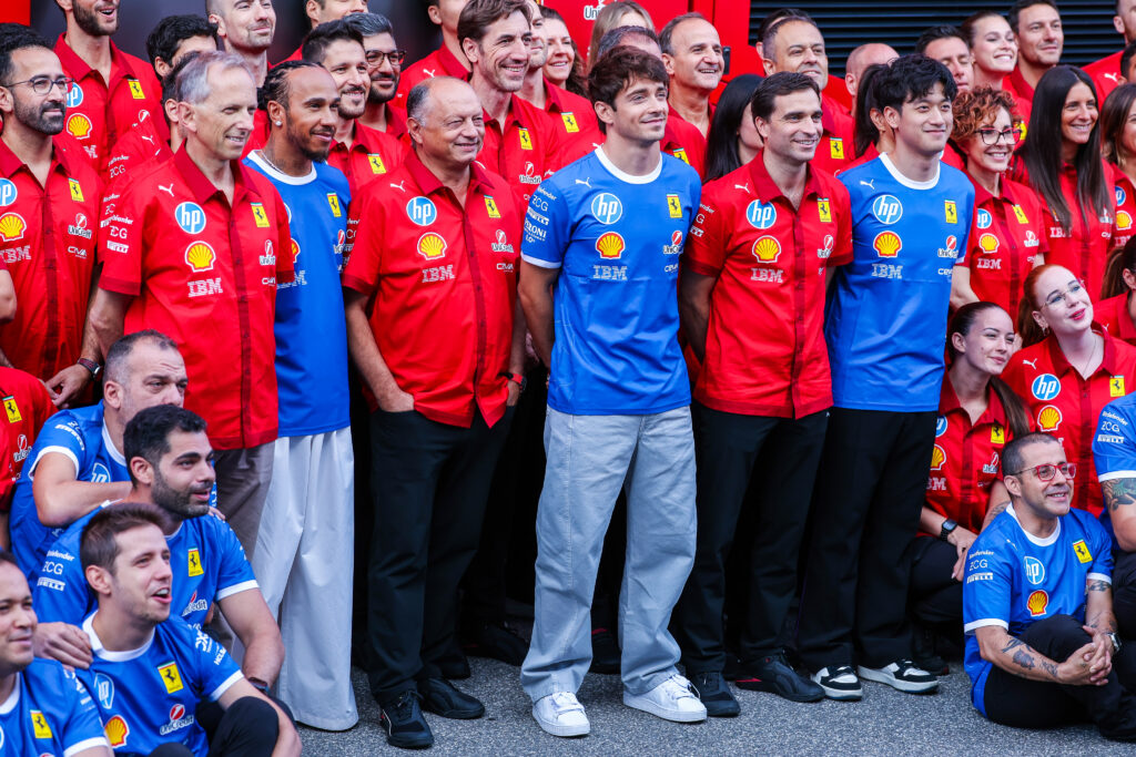Lewis Hamilton, Fred Vasseur, Charles Leclerc in a Ferrari team photo at the 2025 Formula 1 Italian Grand Prix