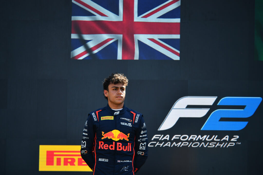 Red Bull junior driver Arvid Lindblad standing on the podium at the 2025 Formula 2 Italian Grand Prix