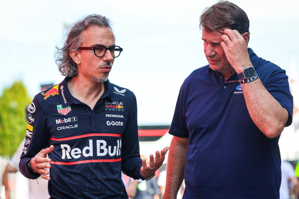 Ford CEO Jim Farley speaks to Red Bull team principal Laurent Mekies in the Monza paddock before qualifying for the 2025 F1 Italian Grand Prix